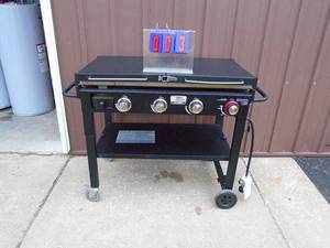 Blue Rhino lp griddle. 36 x 20. Used condition. Needs a good cleaning. Untested. As shown.