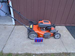 Husquevarna 4 wheel drive mower. Honda motor. Used condition. Tested & works. As shown.