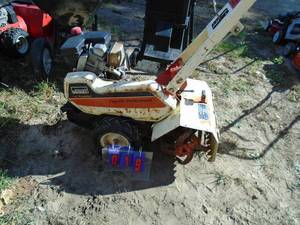 Wards roto tiller transplant motor with new carb. Forward gears only. As shown.
