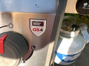 lot 5 image: Weber Grill with cover and tank