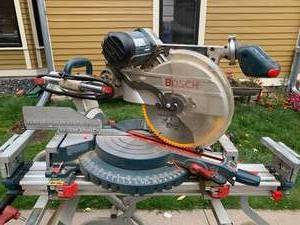 lot 165 image: Bosch Compound Saw