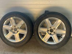 A Pair of Michelin P23555R18 Tires
