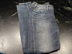 Silver Suki Mid W 33L 31 Jeans...