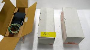 lot 32 image: 3 New Vexta stepping motors C7463-9212KGM and a small Ametek pump