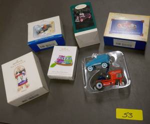 lot 53 image: Lot of 7 Hallmark Ornaments - very cute cars, pedal tractor etc
