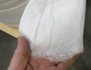 lot 59 image: 2 large 1,000 ft rolls of micro fiber fabric used for masks but also works great for packaging glassware for shipping, 7 wide