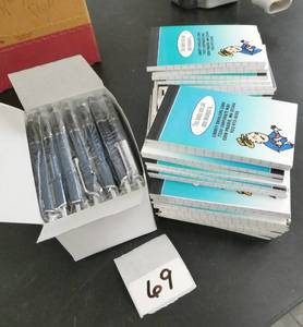 lot 69 image: 50 new pens and 50 notepads