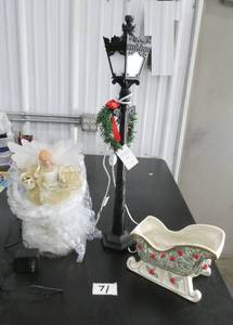 lot 71 image: Christmas streetlamp 26 tall, angel tree topper and a ceramic sleigh great for candy or cards
