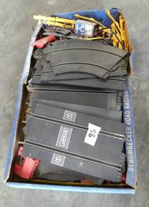 lot 86 image: Vintage Strombecker road racing set, dont know if all pieces are there or if it works