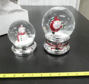 lot 92 image: 2 cute Snow Globes the Santa one plays Jingle bells