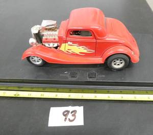 lot 93 image: Hot rod car, all doors open and has a battery slot and then it lights up and gives an engine roar, untested