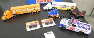 lot 96 image: Collectible toy semi trucks, racecar and atv