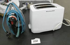 lot 110 image: Nice KitchenAid toaster with bagel size slots and a GE iron and ironing pad