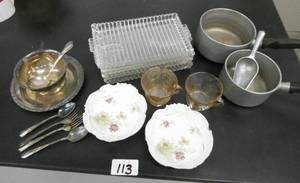 lot 113 image: Vintage kitchen lot - cast aluminum pots, glass snack trays, depression glass cups, bavarian china plates, bowl for nuts and nut crackers