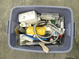 lot 115 image: Tote full of sheetrock tools, plumbing, sand paper etc