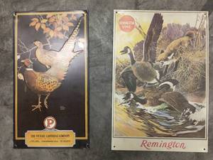lot 126 image: 4 Remington and Winchester tin advertising signs