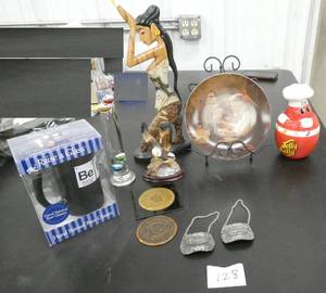 lot 128 image: An ecclectic mix of items, glass weather station, Norman Rockwell plate, beer glass, Jelly Belly container and 2 pewter Brandy and Bourbon hangers
