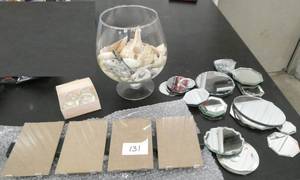 lot 131 image: Large bowl of sea shells, hanging photo frame for 4, and a large lot of small mirrors for your china hutch to highlight small collectibles or a gift shop