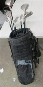 lot 100 image: golf clubs and bag...