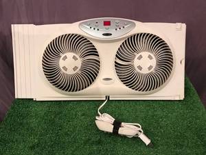 lot 70 image: Bionaire Window Fan with Remote