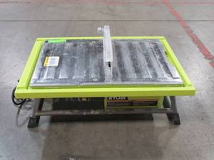 lot 211 image: Used Ryobi 7 in. 4.8 Amp Tile Saw (Missing Stand) Model # WS722SN - Missing waterpump.