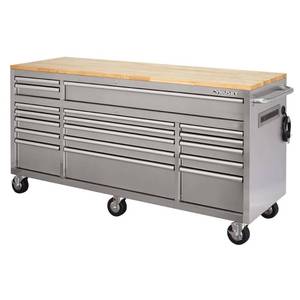 lot 114 image: Husky 72 in. 18-Drawer 24 in. D Mobile Workbench with Solid Wood Top Stainless Steel, HOTC7218JX1M - Scratches on cabinet and top. Missing a few casters.