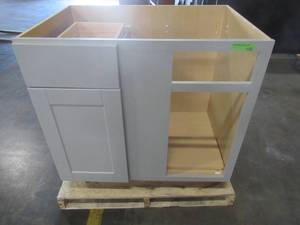 lot 208 image: Hampton Bay Shaker Assembled 36x34.5x24 in. Blind Base Corner Kitchen Cabinet in Dove Gray - Scratch and Dent -  Cracked RH Side Panel and Bottom Back Board.