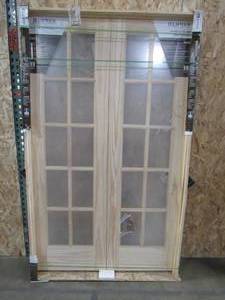 lot 139 image: Jeld-Wen 48 x 80 x 4 916 Pine Double 10 Lite Interior French Doors, Unfinished. Never installed.