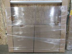 lot 145 image: Simonton Patio Door. Approximate Dimensions 70 x 79 12, White Vinyl ExteriorInterior. No Screen - Never Installed.