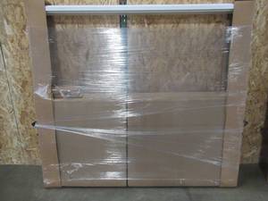 lot 146 image: Simonton Patio Door. Approximate Dimensions 70 x 79 12, White Vinyl ExteriorInterior. No Screen - Never Installed.