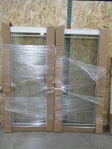 lot 183 image: SIMONTON CUSTOM 6500 Series Pair of Replacement Patio DoorsPanel in White Vinyl - Fits 71 14 x 79 14 Frame, Internal Grid. - Never Installed.