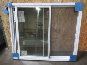 lot 191 image: American Craftsman Sliding Window in White Vinyl With Screen. 46 14 x 54 x 3 14 Wall.  - Internal window lock needs to be reattached as well as some trim pieces.