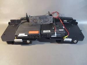 Two PMT Laptop Docking Stations and Two Motorola Modems
