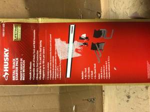 lot 12 image: Garage Wall Track Starter Kit (5-pieces) by Husky Customer Returns See Pictures