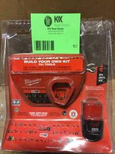 lot 16 image: Milwaukee M12 BATTERY AND CHARGER Customer Returns See Pictures