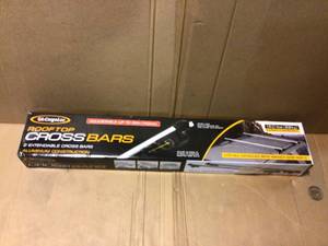 lot 60 image: 2-Piece Adjustable Roof Top Cross Bar Set, for Use with Existing Raised Side Rails Only by CargoLoc  Customer Returns See Pictures