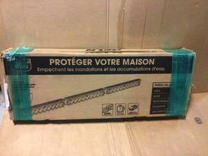 lot 63 image: Storm Drain Series 5 in. W x 5.25 in. D x 39.4 in. L Channel Drain Kit with Black Grate (3-Pack) by RELN Customer Returns See Pictures
