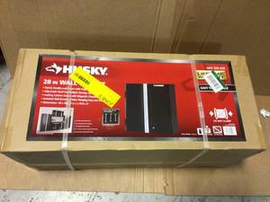 lot 67 image: Ready-to-Assemble 24-Gauge Steel Wall Mounted Garage Cabinet in Black (28 in. W x 29 in. H x 12 in. D) by Husky Customer Returns See Pictures