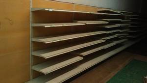 4 ft. Single Sided Retail Shelving. End posts (5) and bases (5) and extra shelving.