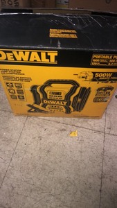 lot 17 image: DEWALT 1600 Peak Amp Portable Car Jump Starter with 120 PSI Digital Air Compressor and 500-Watt Inverter