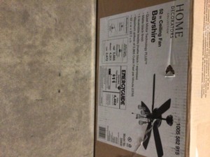 lot 41 image: Home Decorators Collection 52 in. Bay City Indoor LED Matte Black with Brass Accents Dry Rated Ceiling Fan with Light Kit and 5 Reversible Blades