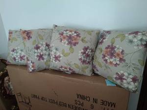 Four Floral Throw Pillows