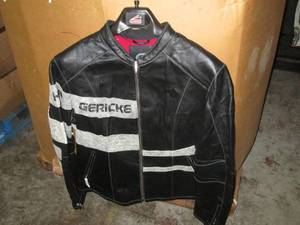 lot 11 image: New with tags and hanger Black Hein...