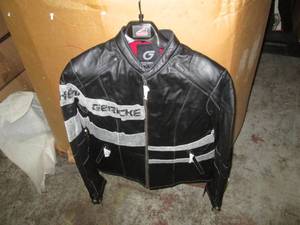 lot 12 image: New with tags and hanger Black Hein...