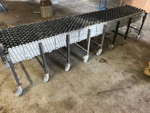 lot 23 image: Rolling expandable conveyor...