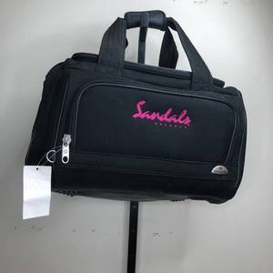 lot 42 image: Sandals Resort Luggage Bag