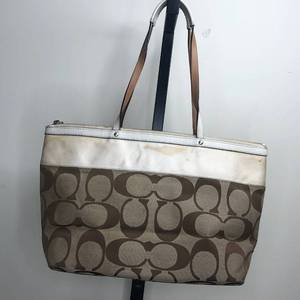 lot 47 image: Brown Coach Monogram Bag