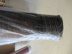 lot 14 image: Brown with Black Border 710 x 9 10 IndoorOutdoor Area Rug