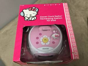 lot 625 image: Hello Kitty Stereo Clock RadioRecharging Station for iPod Brand New and Digital Cordless Phone