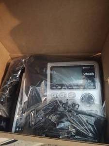 lot 195 image: Vtech desktop phone. Brand new stil...